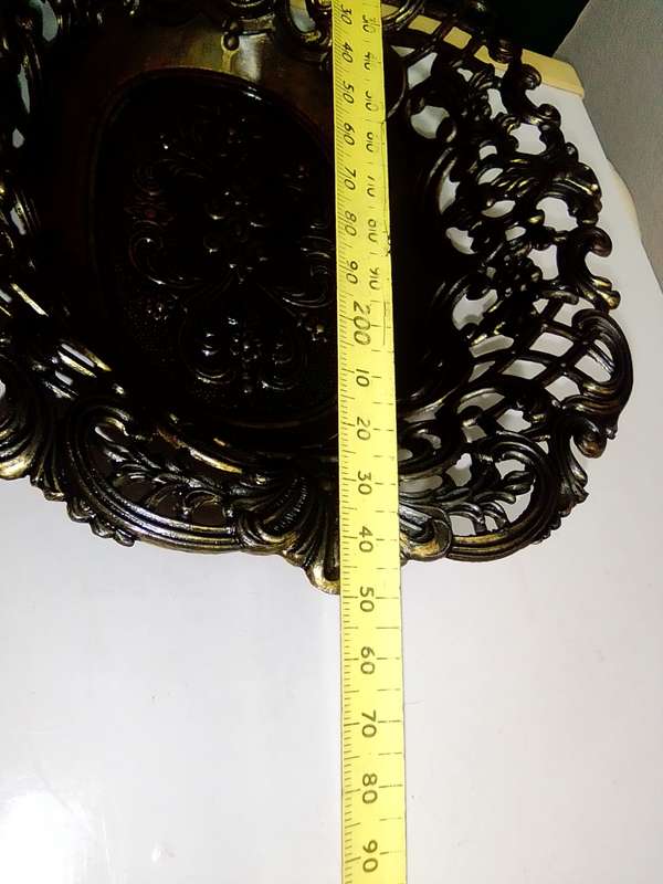 A Vintage Bronze trinket dish with filigree and a stamp ` Mod dep made in Italy `