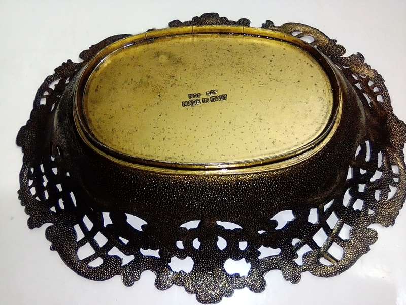 A Vintage Bronze trinket dish with filigree and a stamp ` Mod dep made in Italy `