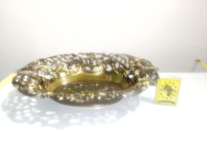 A Vintage Bronze trinket dish with filigree and a stamp ` Mod dep made in Italy `