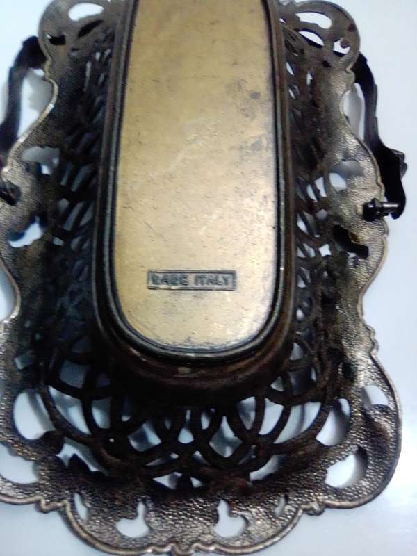 A Vintage Bronze trinket dish with handle + fretwork and filigree stamped made in `Italy`.