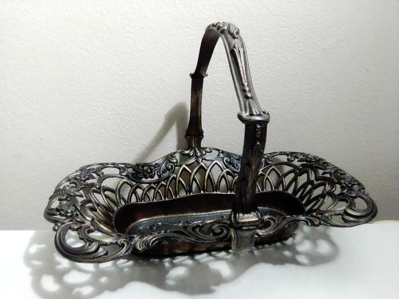A Vintage Bronze trinket dish with handle + fretwork and filigree stamped made in `Italy`.