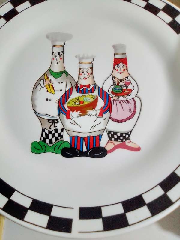 A vintage Trisa Stoneware Fat Chef bowl plus 5 matching large dinner plate`s plus a Chef timer.