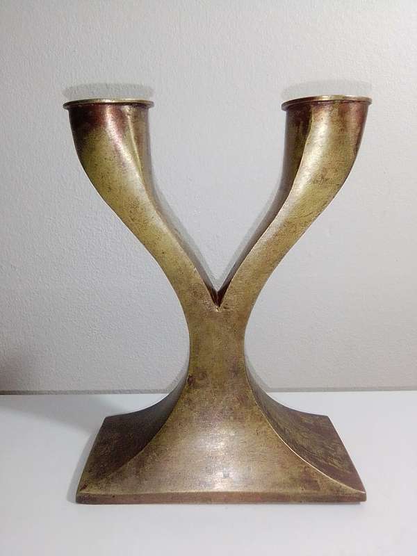 A 1960 vintage Brutalist heavy solid Bronze candle stick, hand crafted by means of Sand casting.i