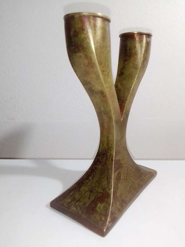 A 1960 vintage Brutalist heavy solid Bronze candle stick, hand crafted by means of Sand casting.i