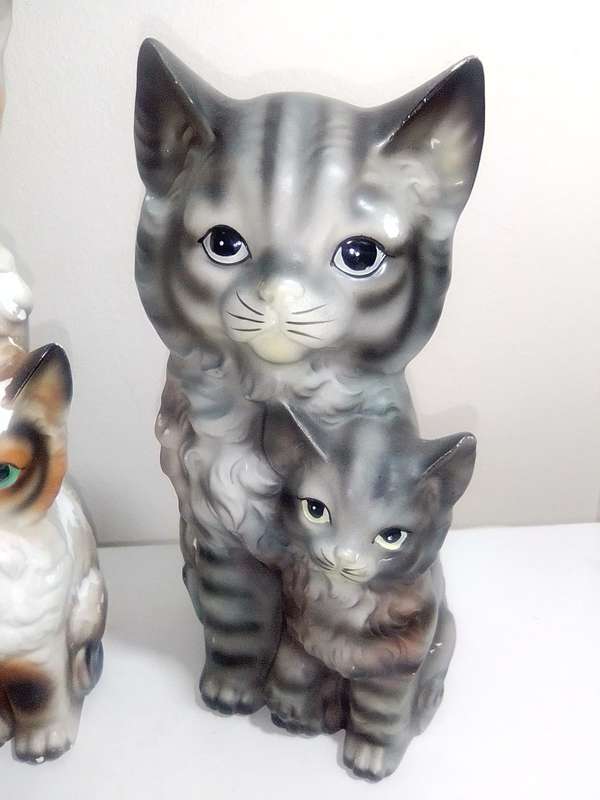 Late 1940`s. 3 Awesome porcelain Cats with their kittens they need Tlc. No Chips or Cracks.
