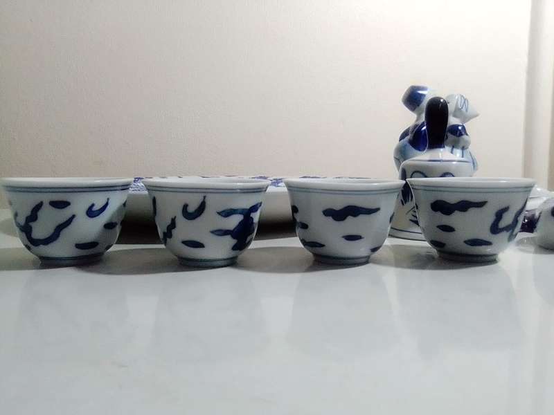 Ceramic collection. Elweco Delft ware Figurine, China Sun, Constantia plate, Cloggs 4 Sake` cups