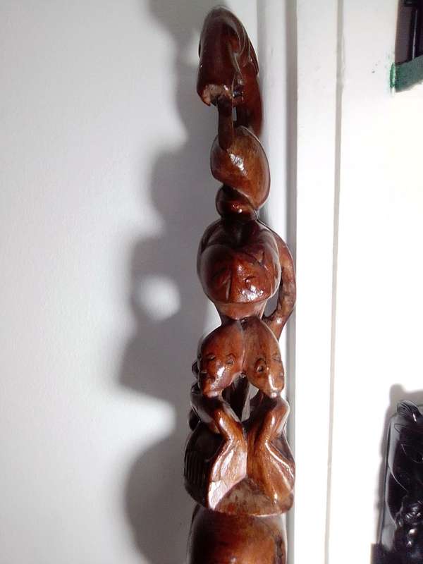 The Nyaminyami is described as having the body of a snake the head of a fish. Ethnic Walking Stick.