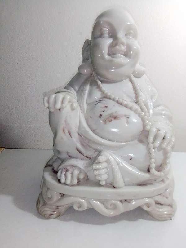 Antique Large and Heavy 4.5Kg`s laughing Buddha cast in crushed marble stone and Resin mixture.
