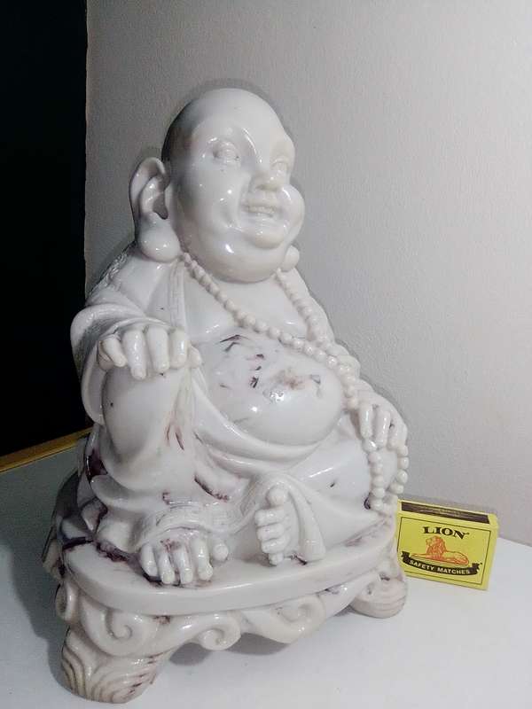 Antique Large and Heavy 4.5Kg`s laughing Buddha cast in crushed marble stone and Resin mixture.
