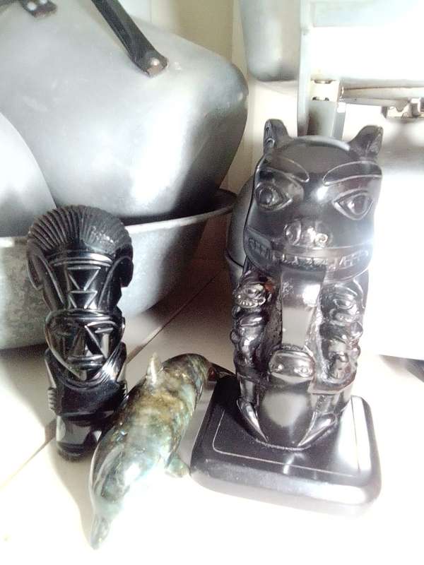 Tiki Idol god. Black Onyx obsidian Aztec carved statue Mayan stone. A black Onyx Dolfin & large Idol