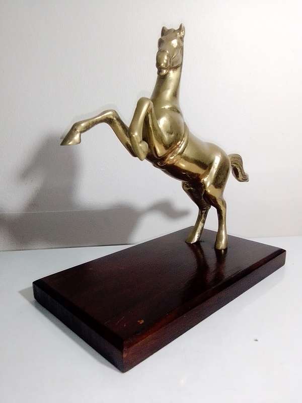 A Old very heavy 2.6Kg Brass Stallion rearing up on wood stand. A Impressive solid Brass horse.
