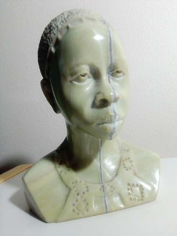 A exquisitely hand carved Jade green African bust by artist Willis Nxumalo from KZN in RSA.   1.1Kgs