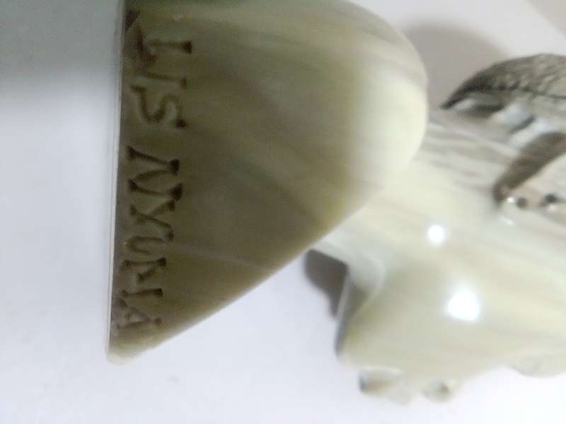 A exquisitely hand carved Jade green African bust by artist Willis Nxumalo from KZN in RSA.   1.1Kgs