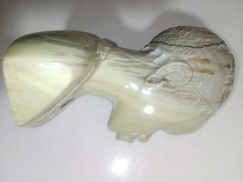 A exquisitely hand carved Jade green African bust by artist Willis Nxumalo from KZN in RSA.   1.1Kgs