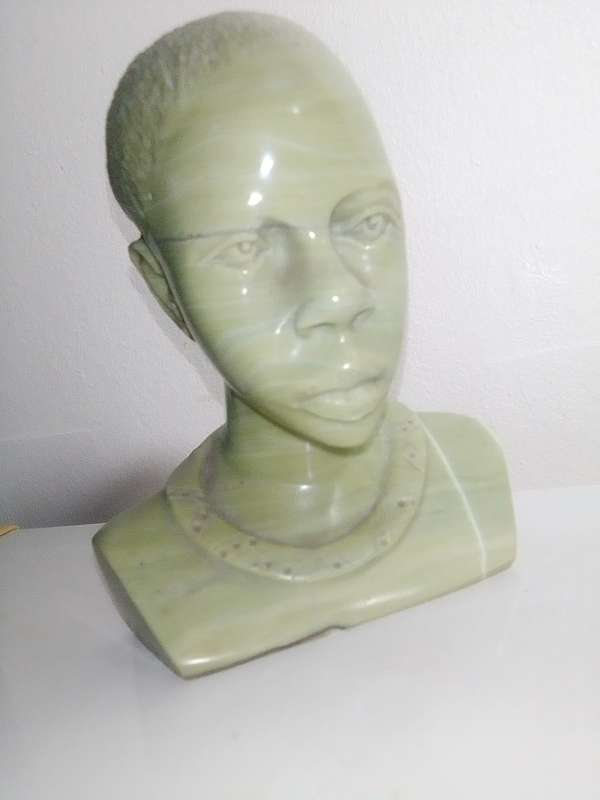 Hand crafted in Jade green signed `WS NXUMALO` was born in Magud, Natal in 1952. He is a self-taught
