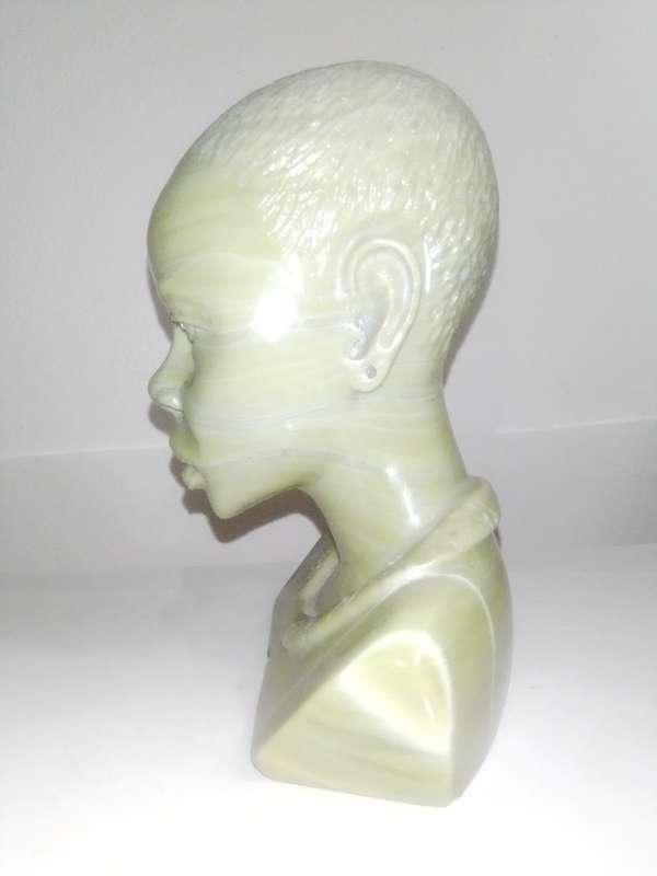 Hand crafted in Jade green signed `WS NXUMALO` was born in Magud, Natal in 1952. He is a self-taught