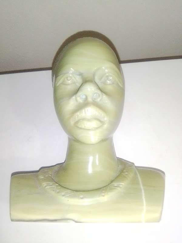 Hand crafted in Jade green signed `WS NXUMALO` was born in Magud, Natal in 1952. He is a self-taught