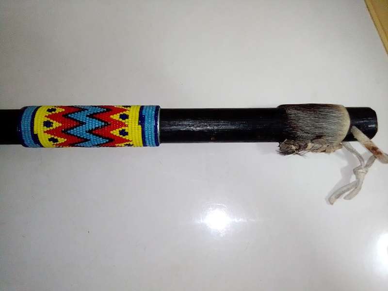 2 vintage Traditional African Throwing Axes with Beads/Buck skin.