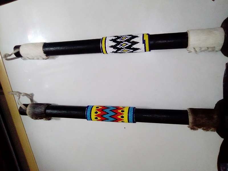 2 vintage Traditional African Throwing Axes with Beads/Buck skin.
