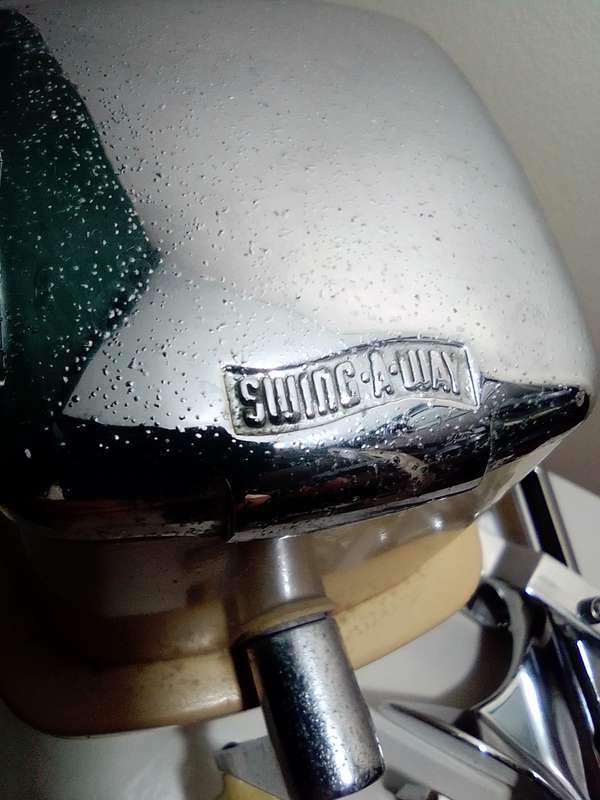 A manual working "Swing-A-Way" Ice crusher plus a table mounted Large wine bottle Cork puller.