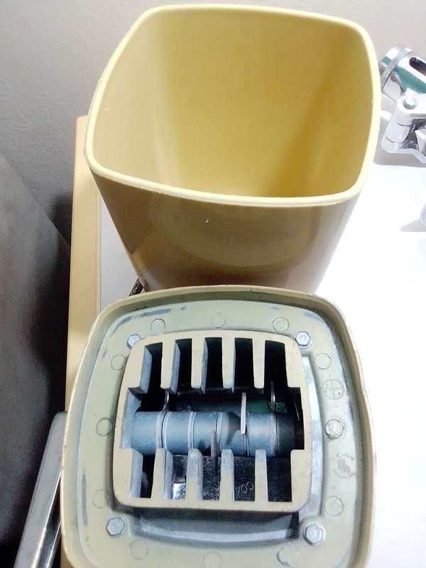 A manual working "Swing-A-Way" Ice crusher plus a table mounted Large wine bottle Cork puller.