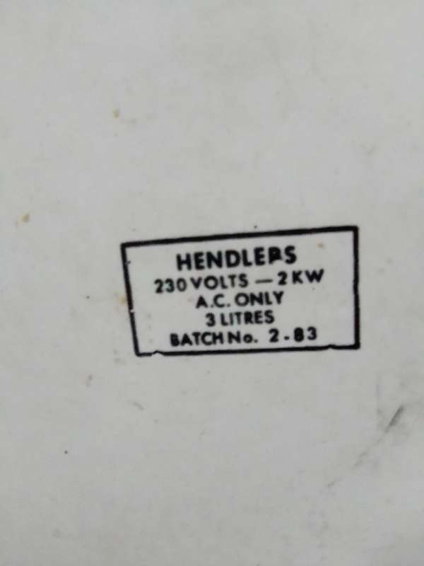 A Hendlers whistling white Enamel manual 3 footed electric 3Lt Kettle a flower motif.