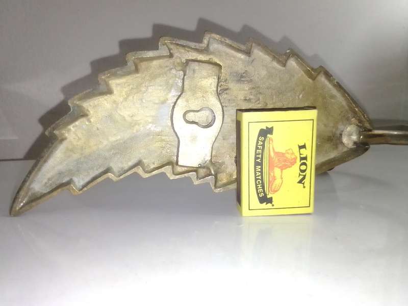 Ebay 495$. 197o's Leaf Shaped Candle Wall Sconce Solid heavy Brass 1970s. Great for home wall Decor.