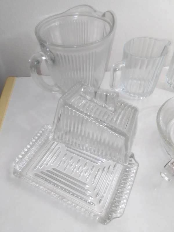 5 clean vintage glass kitchen Glass sets. 2 Water Jugs, Lidded Jar, Butter Dish. Lemon Squeeze.