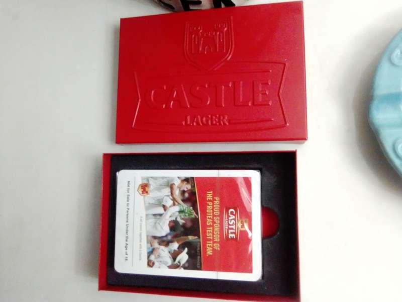 Wow Mancave, Castle branded red metal case with playing Cards in ashtray + Multi-Tool Kit + Jug's.