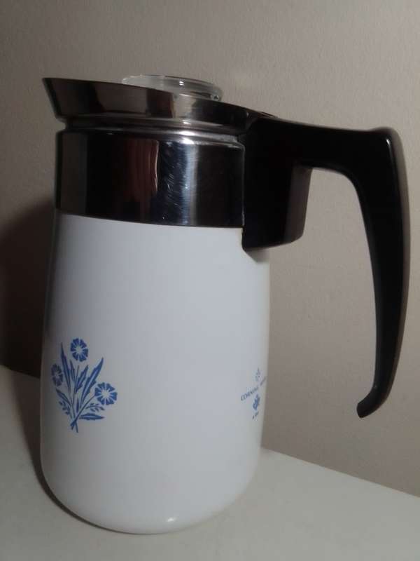 This is a great vintage Corning Ware 6 cup coffee pot with the Blue Cornflower design on both sides.