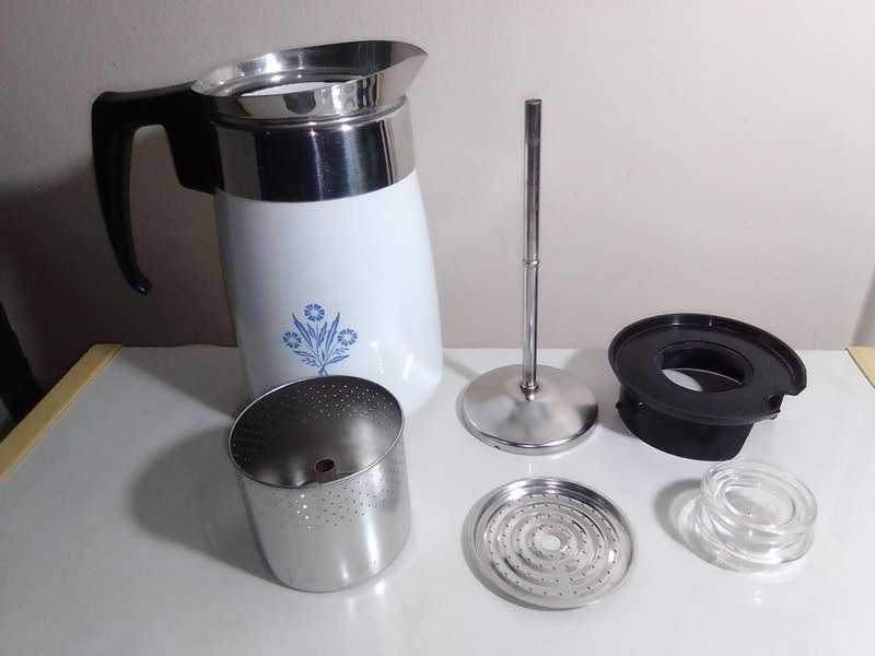 This is a great vintage Corning Ware 6 cup coffee pot with the Blue Cornflower design on both sides.