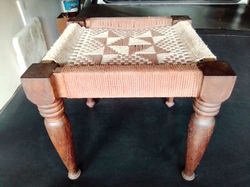 A very old ethnic hand woven seat in good condition for its age. Size 29cm x 31cm.