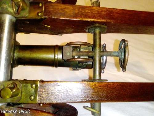 Belonged to a Sea Captain a bronze barrel Dragon motif Canon. It has a Hight adjusting wheel.