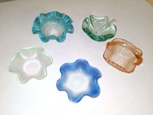 6 x Venetian Glass trinket holder`s 3 x Hankychif dishes and a basket plus a leaf trinket bowl.