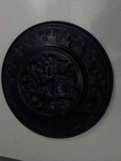 A Medieaval Tavern scene wall plate with a lot of caritor. Lovely Decor.