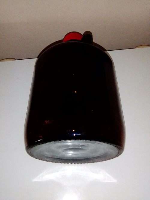 A Very Large Old vintage dark brown Medicine bottle with lid and in good second condition.