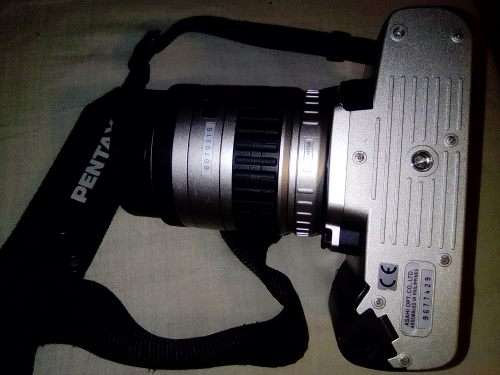 A Pentax AZ50 with 28-80mm lens in carry bag. In fair used condition.