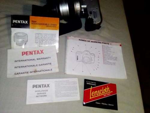 A Pentax AZ50 with 28-80mm lens in carry bag. In fair used condition.