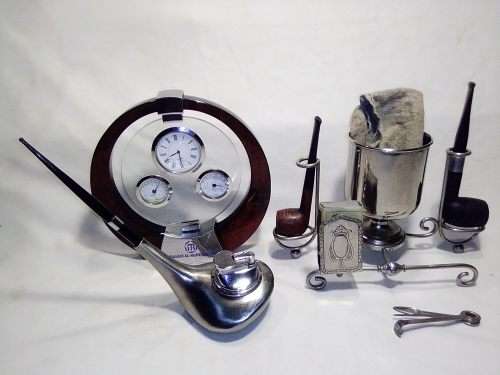 A vintage smokers companion lot. 2 Signed Pipe`s,Lighter, Weather station,Smokers Companion.