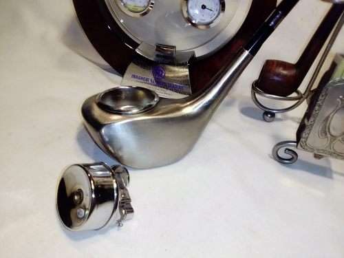 A vintage smokers companion lot. 2 Signed Pipe`s,Lighter, Weather station,Smokers Companion.
