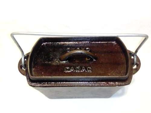 A Cadac castiron bread Lidded pot with handle for camping. Rare and Scarce.