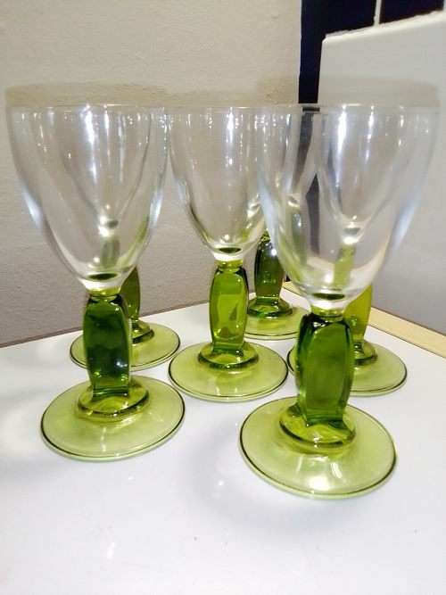 Six green Venetian Cherry glasses. All in good condition.