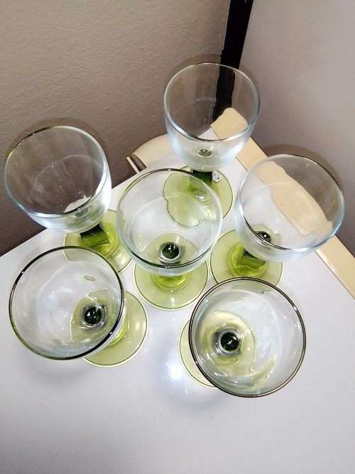 Six green Venetian Cherry glasses. All in good condition.