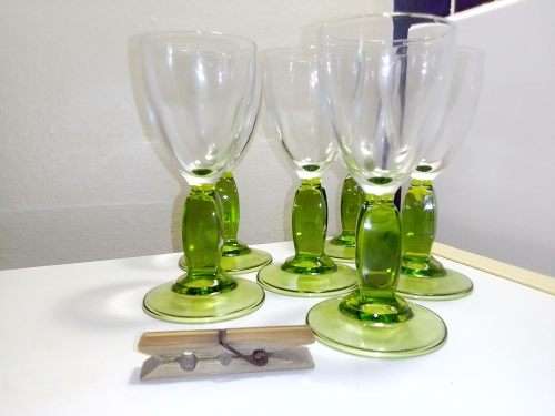 Six green Venetian Cherry glasses. All in good condition.