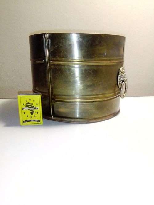 A large old vintage Lion`s head silver in colour handled solid Brass Planter. With nice platina.