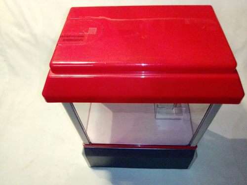 A `Toy Grab Machine` been in storage a long time bu still in good condition for age.