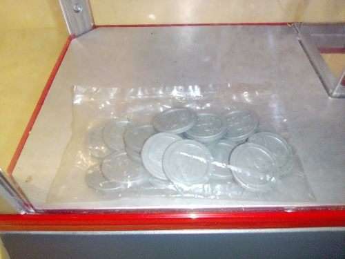 A `Toy Grab Machine` been in storage a long time bu still in good condition for age.