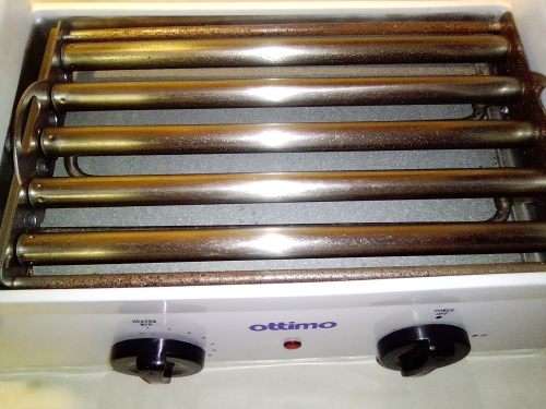 Nostalgia `Ottimo` hot dog roller griller for the `Man Cave` as a real conservational piece.