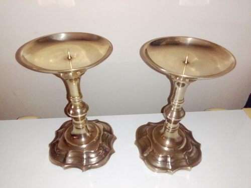 Vintage solid brass, A very heavy pair of Brass Candlesticks. In good condition.