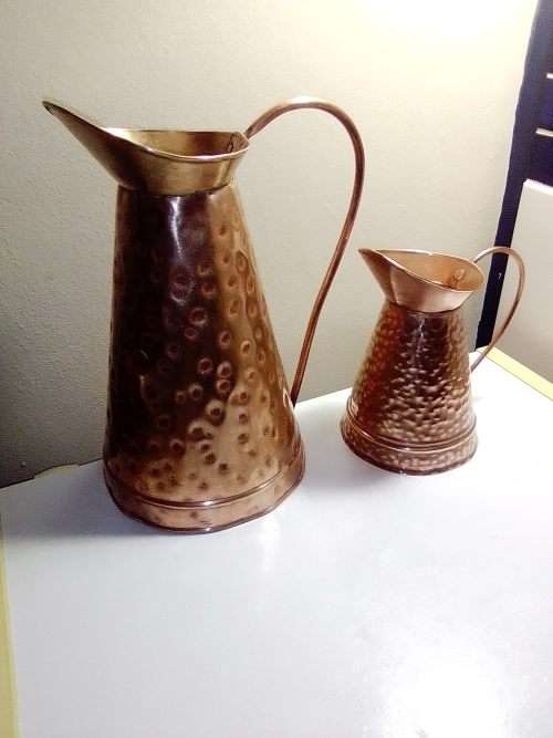 Two old vintage hand beaten copper Jug`s and in good shape. In good condition.
